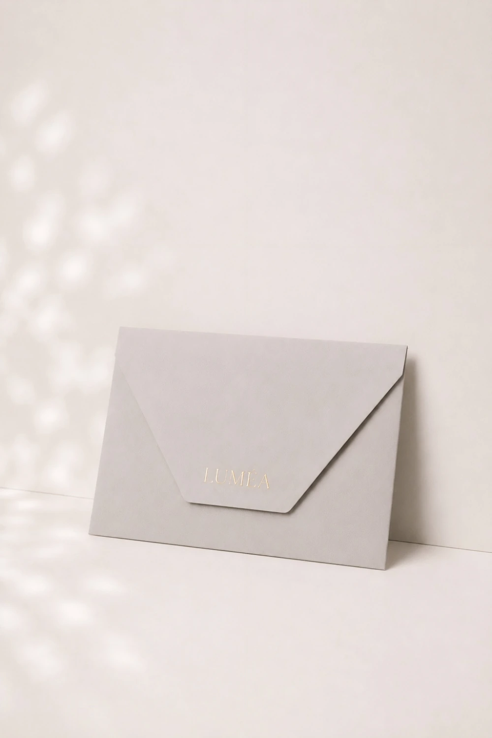 Luméa envelope with gold foil logo